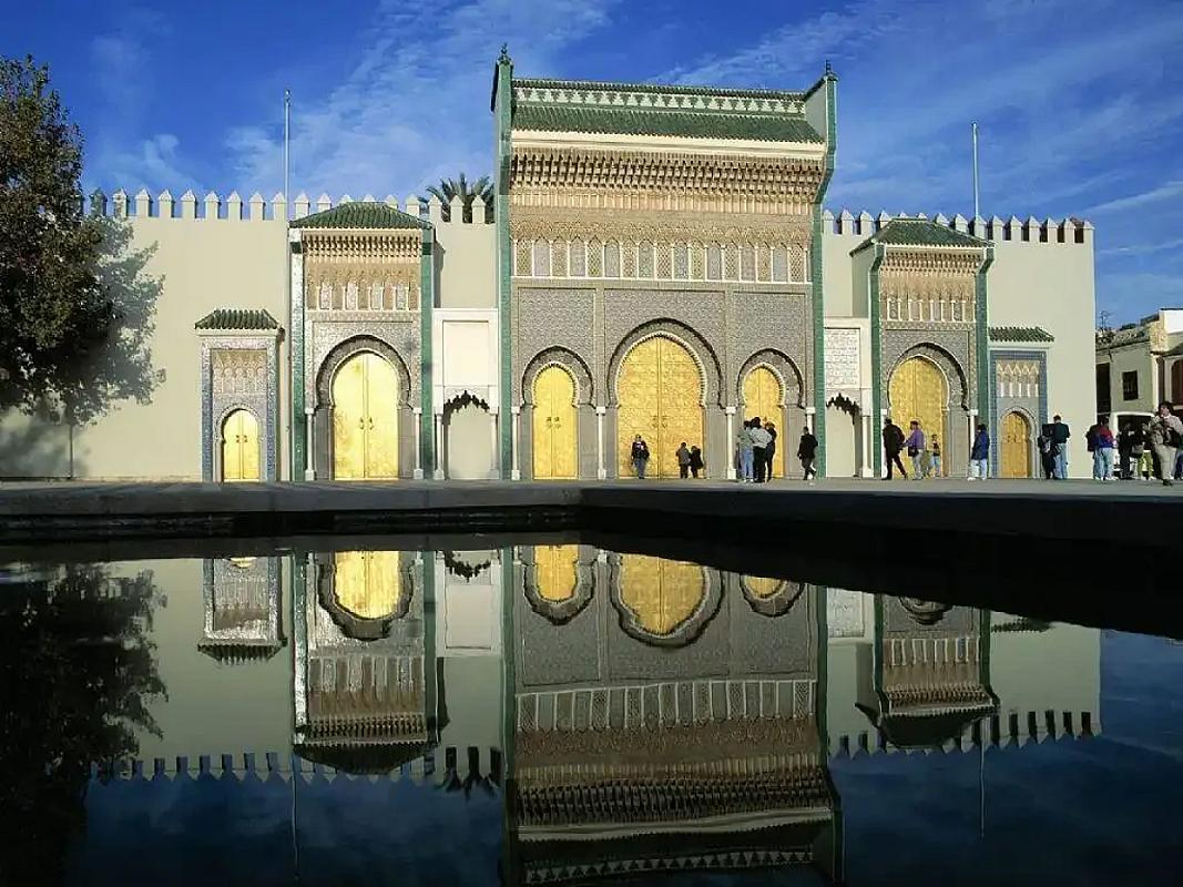 Ornate golden gates of the Royal Palace in Fes