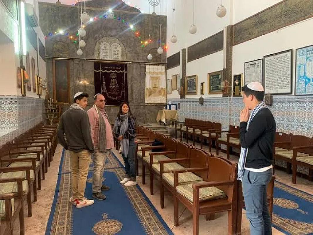 Visitors inside the Slat al-Azama synagogue in the Marrakech Mellah