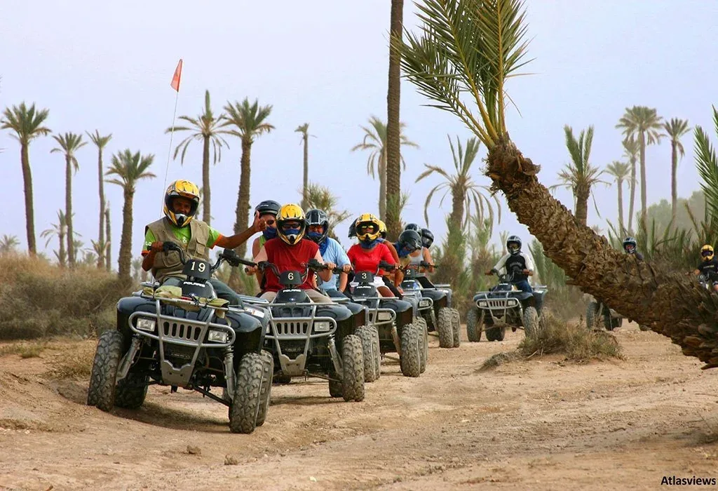 Group riding quad bikes through the Marrakech Palmeraie