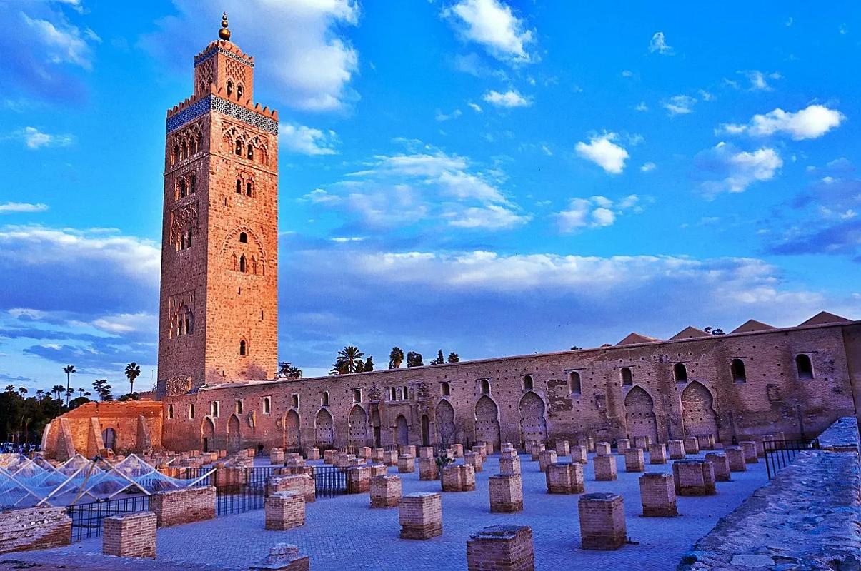 Koutoubia Mosque minaret above the trees of central Marrakech