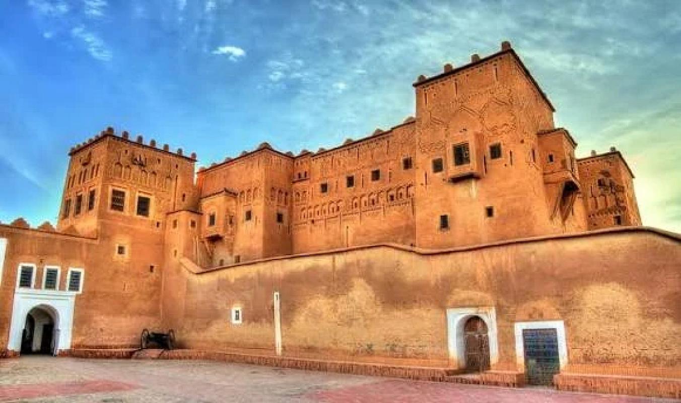 Taourirt Kasbah rising over its square in Ouarzazate