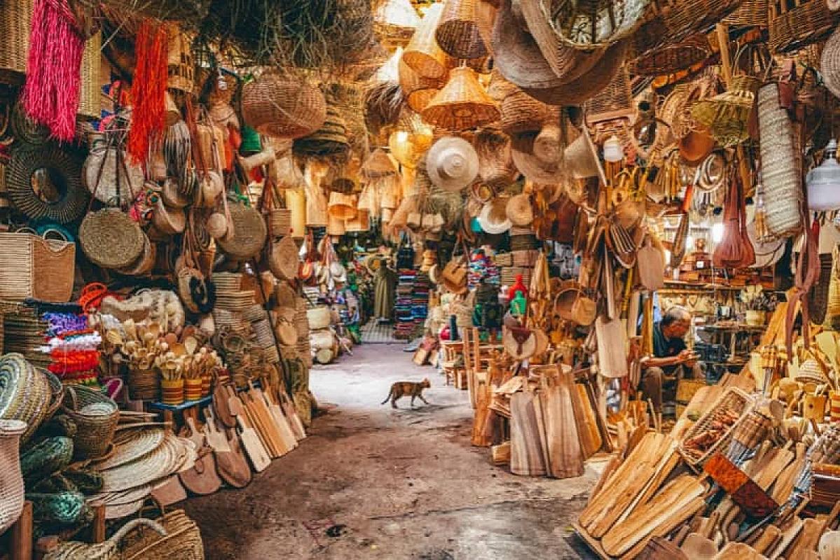 Baskets and woodwork filling a covered souk in Marrakech