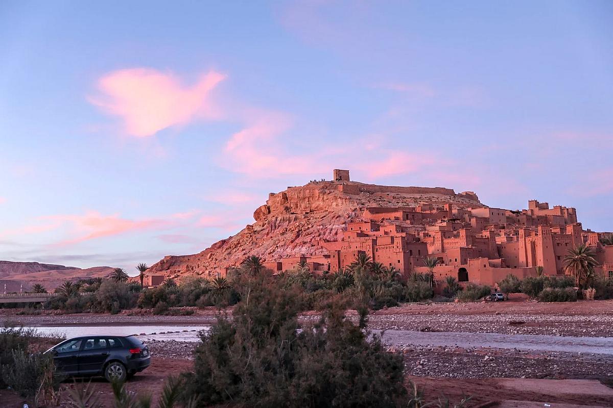 Ait Benhaddou ksar on its hillside in soft evening light
