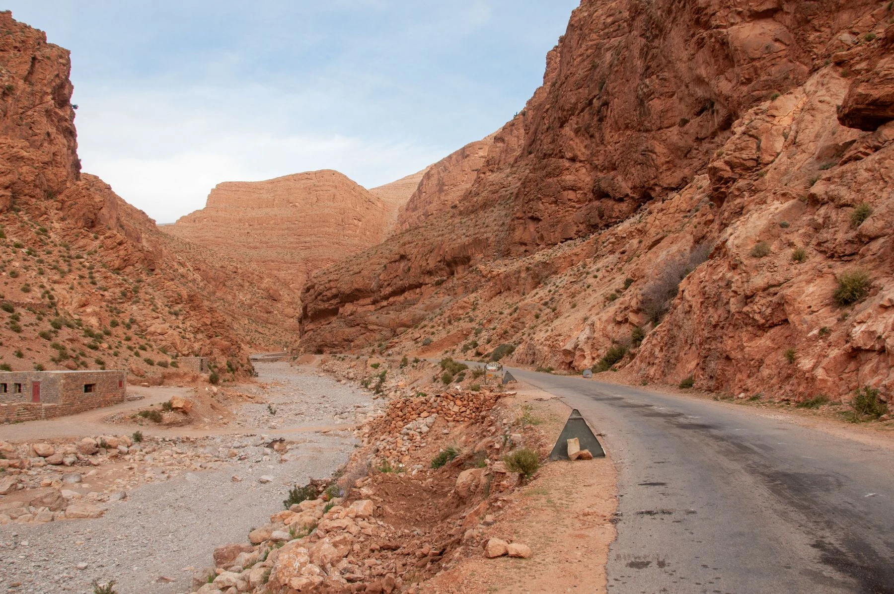 Road running through the red rock walls of the Todra gorge area
